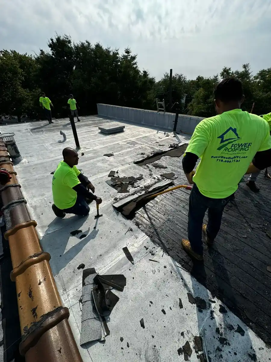 Power Roofing Nyc Crew Completing Roof Repair Work Power Roofing Nyc Crew Completing Roof Repair Work